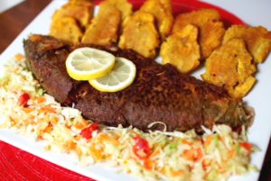 Read more about the article Fried Fish with Fried Green Plantains and Pikliz